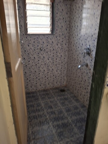 Bathroom in 1 RK Apartment at Megh Malhar Co-op Housing Society, Ghansoli – for Rent