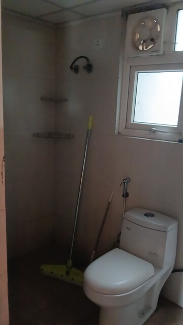 Bathroom in 2 BHK Apartment at AFOWO Raksha Addela, Sector 16c Greater Noida – for Rent