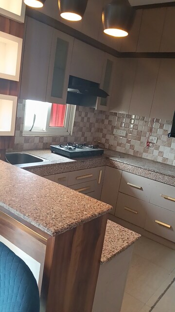 Kitchen in 2 BHK Apartment at AFOWO Raksha Addela, Sector 16c Greater Noida – for Rent