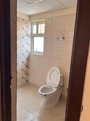 Bathroom in 2 BHK Apartment at Migsun Roof, Raj Nagar Extension – for Rent