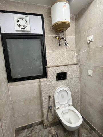 Bathroom in 3 BHK Apartment at Dhakoli – for Sale