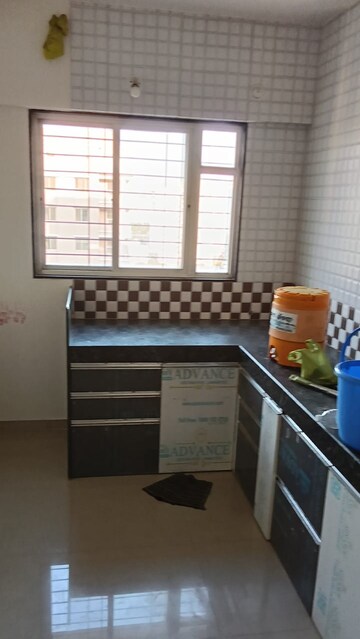 Kitchen in 2 BHK Apartment at Tanish Pearls, Charholi Budruk – for Rent