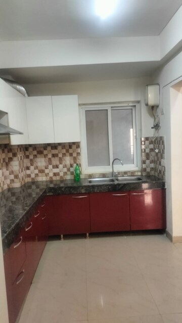 Kitchen in 4 BHK Apartment at RPS Savana, Sector 88 – for Rent