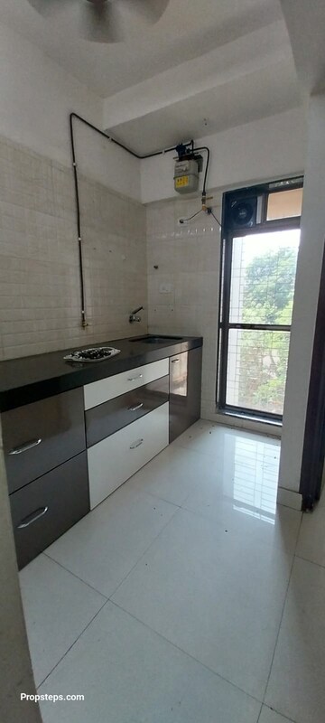 Kitchen in 1 BHK Apartment at Sheth Irene, Malad West – for Sale