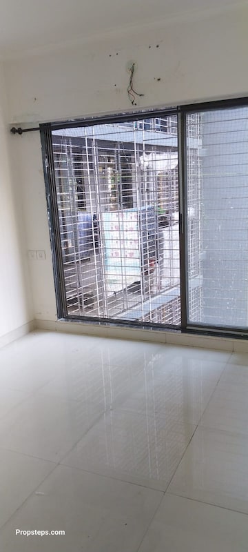 Room in 1 BHK Apartment at Sheth Irene, Malad West – for Sale