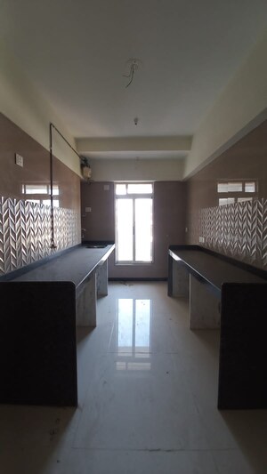 Kitchen in 1 BHK Apartment at Sheth Irene, Malad West – for Sale
