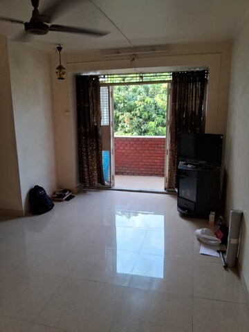 Living Room in 2 BHK Apartment at Madhavbaug Society, Bhusari Colony – for Rent