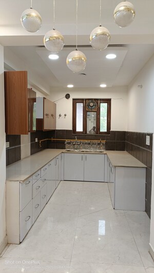 Kitchen in 4 BHK Builder Floor at Ashoka Enclave – for Sale