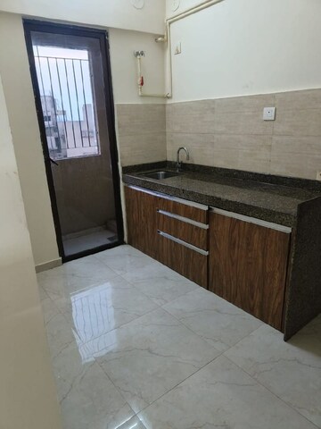 Kitchen in 2 BHK Apartment at Sunteck One World, Naigaon East – for Sale