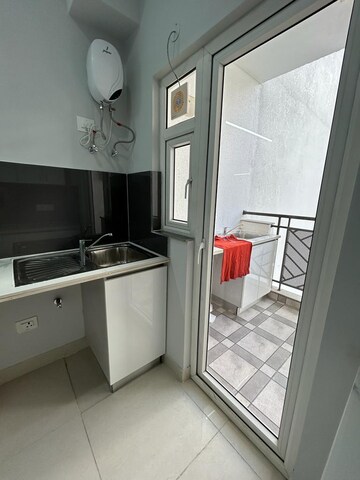 Kitchen in 3 BHK Apartment at Central Park Flower Valley Aqua Front Towers, Sohna Sector 33 – for Rent