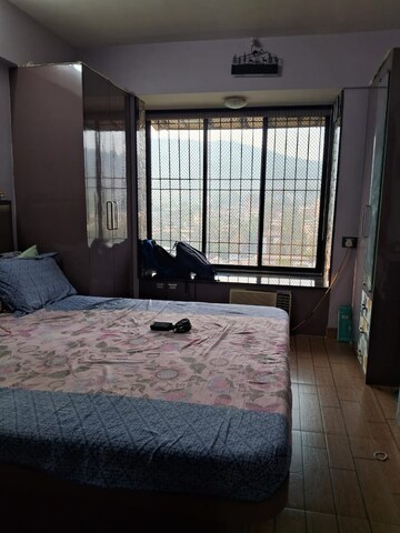 Bedroom in 2 BHK Apartment at Cirrus CHSL Cosmos Paradise, Vasant Vihar – for Sale