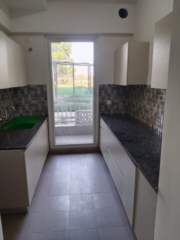 Kitchen in 2 BHK Apartment at HCBS Sports Ville, Sohna Sector 35 – for Rent