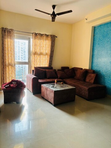 Living Room in 2.5 BHK Apartment at Aims Golf City, Sector 75 – for Rent