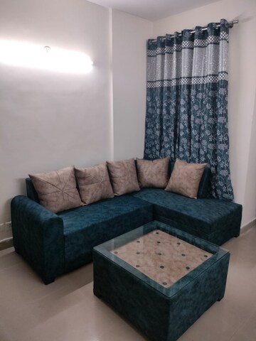 Living Room in 2 BHK Apartment at Sikka Karnam Greens, Sector 143b – for Rent