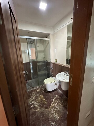 Bathroom in 4 BHK Apartment at DB Orchid Woods, Goregaon East – for Rent