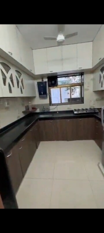 Kitchen in 3 BHK Apartment at Sai Jyote Apartment, Vile Parle West – for Rent