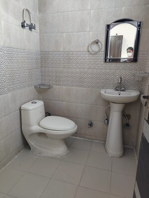 Bathroom in 2 BHK Apartment at Gulmohur Garden, Raj Nagar Extension – for Sale