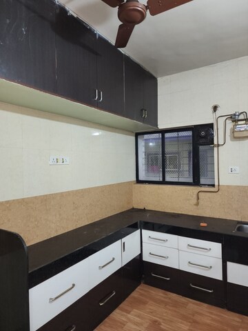 Kitchen in 2 BHK Apartment at Madhuraj Nagar Society, Kothrud – for Rent