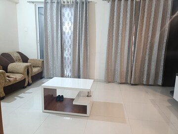 Living Room in 2 BHK Apartment at Gini Belvista Phase 1, Dhanori – for Rent