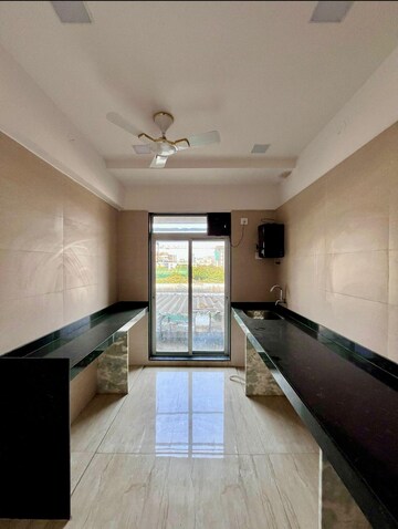 Kitchen in 1 BHK Apartment at Samrin White Rose, Louis Wadi – for Sale