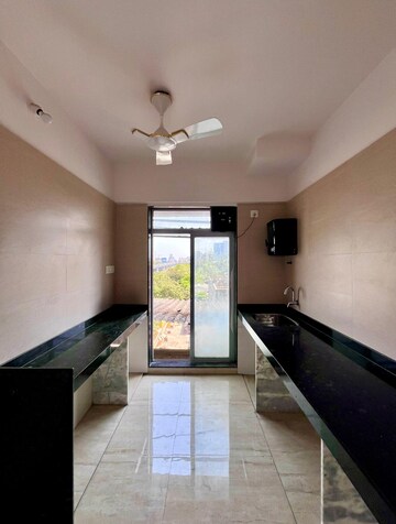 Kitchen in 2 BHK Apartment at Samrin White Rose, Louis Wadi – for Sale