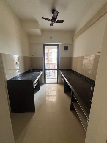 Kitchen in 2 BHK Apartment at Lodha Lakeshore Greens, Dombivli East – for Sale