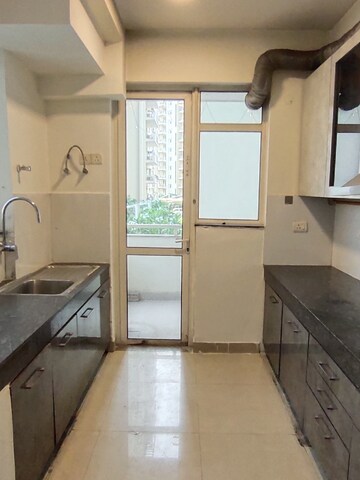 Kitchen in 4 BHK Apartment at M3M Woodshire, Sector 107 – for Rent