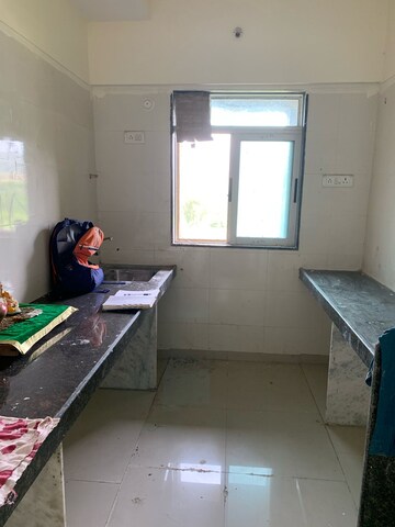 Kitchen in 2 BHK Apartment at Puranik City, Kasarvadavali – for Sale