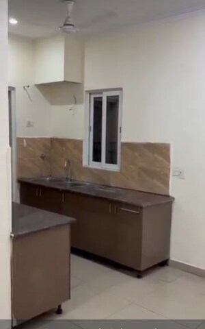 Kitchen in 2 BHK Apartment at Gaurs Cascades, Raj Nagar Extension – for Sale