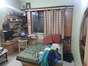 Living Room in 2 BHK Apartment at Gangadham Apartment, Market Yard – for Sale