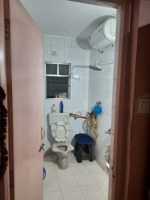 Bathroom in 2 BHK Apartment at Gangadham Apartment, Market Yard – for Sale