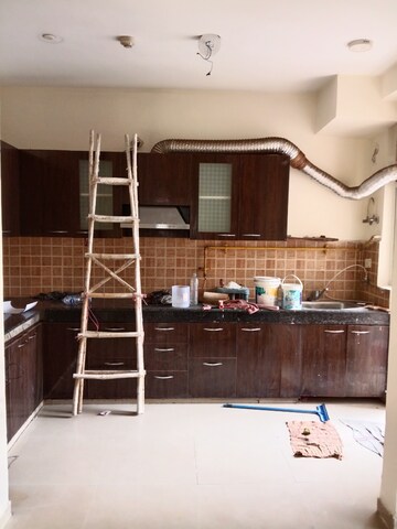Kitchen in 3 BHK Apartment at Mahagun Mywoods, Sector 16c Greater Noida – for Rent