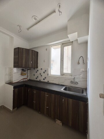Kitchen in 2 BHK Apartment at Omkar Royal Nest, Tech Zone 4 Greater Noida – for Sale