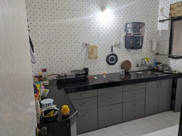 Kitchen in 2 BHK Apartment at Goel Ganga Nebula, Viman Nagar – for Rent
