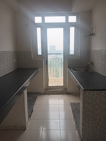 Kitchen in 2 BHK Apartment at Aditya Luxuria Estate, Dasna – for Rent