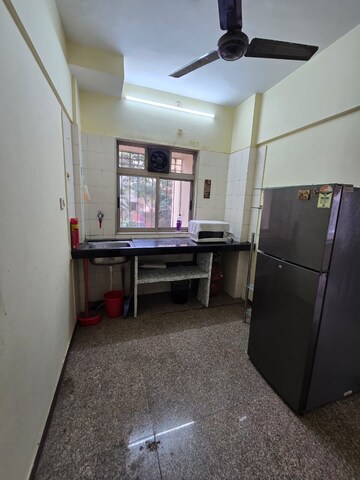 Kitchen in 1 BHK Apartment at Om Siddhi CHS Malad, Malad West – for Rent