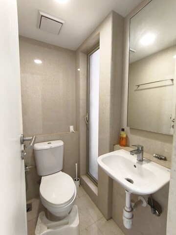 Bathroom in 1 BHK Apartment at Hiranandani Estate Solitaire C, Ghodbunder Road – for Rent