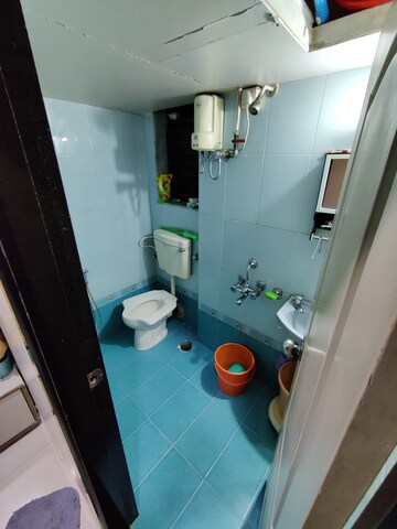 Bathroom in 1 BHK Apartment at Shree Radhe Darshan, Kandivali West – for Rent