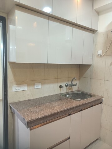 Kitchen in 3 BHK Apartment at Lotus Panache, Sector 110 – for Rent