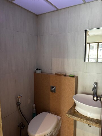 Bathroom in 2 BHK Apartment at Rustomjee Paramount, Khar West – for Rent