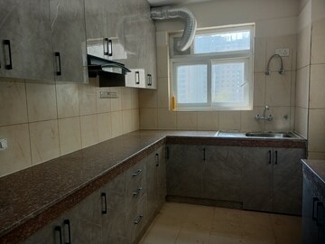 Kitchen in 4 BHK Apartment at 3C Lotus Panache, Sector 110 – for Rent
