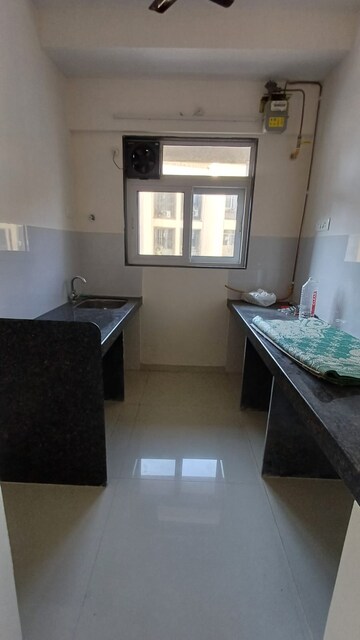 Kitchen in 1 BHK Apartment at Ashar Axis, Majiwada – for Rent