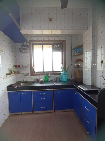 Kitchen in 2 BHK Apartment at Cosmos Habitat, Majiwada – for Rent