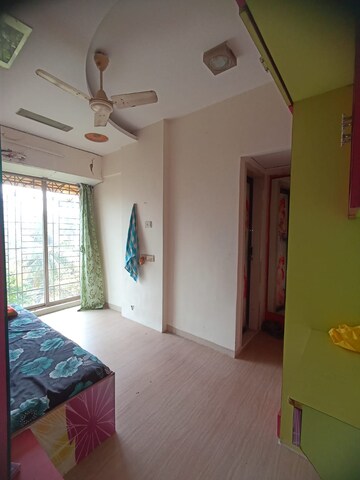 Bedroom in 2 BHK Apartment at Cosmos Habitat, Majiwada – for Rent