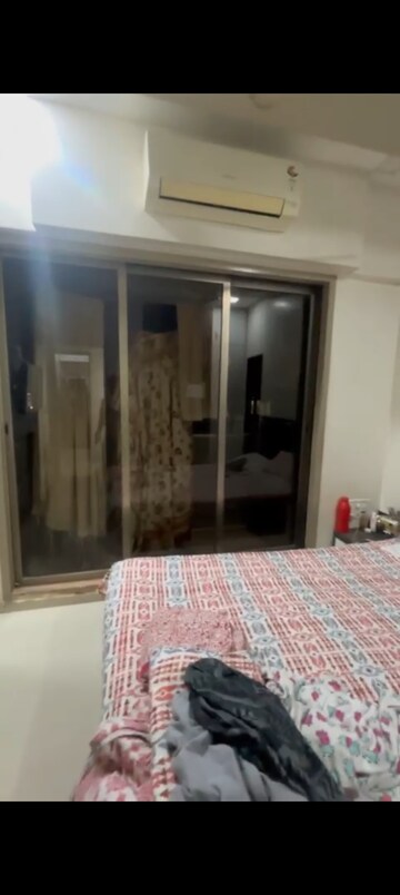Bedroom in 2 BHK Apartment at Sai Dham CHS Kandivali, Kandivali West – for Rent