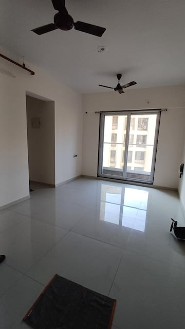 Living Room in 1 BHK Apartment at Ashar Axis, Majiwada – for Rent