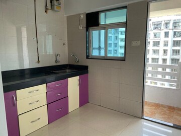 Kitchen in 1 BHK Apartment at Cosmos 27 Gbr, Kasarvadavali – for Sale