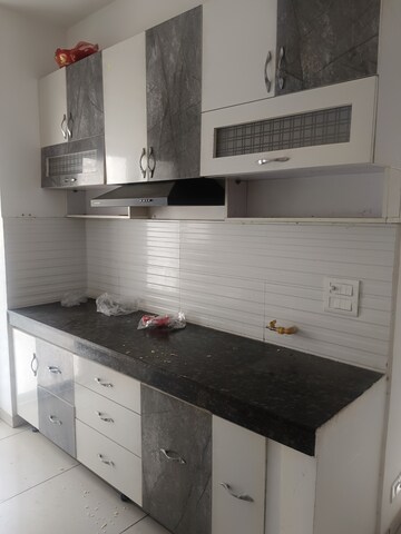 Kitchen in 2 BHK Apartment at Gulshan Bellina, Sector 16 Greater Noida – for Rent