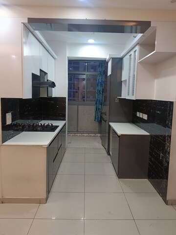 Kitchen in 2 BHK Apartment at Gulshan Bellina, Sector 16 Greater Noida – for Rent