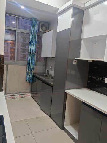 Kitchen in 2 BHK Apartment at Gulshan Bellina, Sector 16 Greater Noida – for Rent